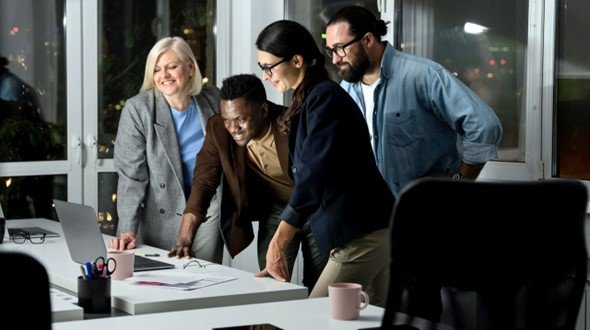 Team working on most profitable businesses tech startup in a modern office environment